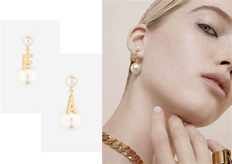 dior swing earring|Dior pearl earrings.